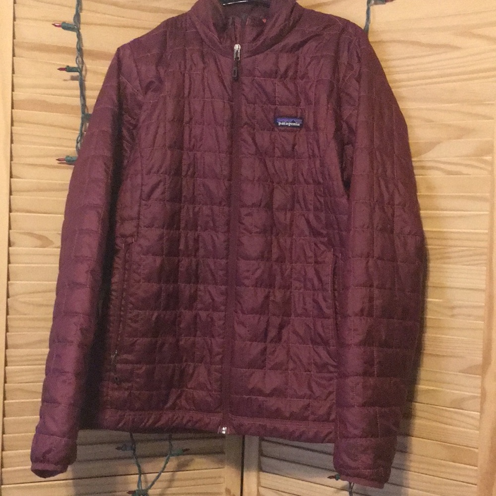 Women’s size XL maroon jacket.